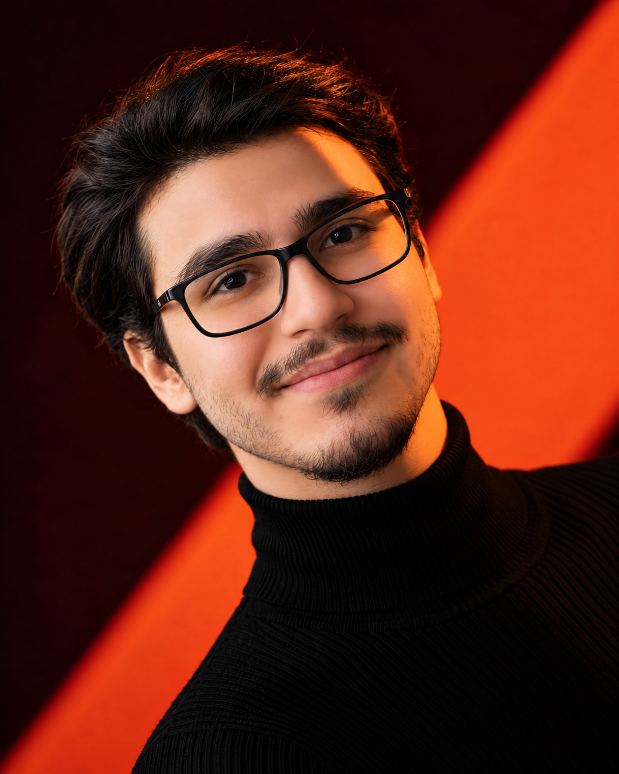 Rami, graphic and motion designer, at his studio desk